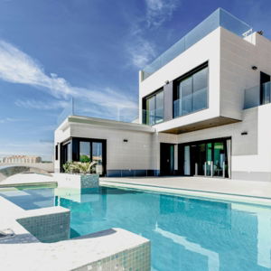 white concrete building under blue sky during daytime